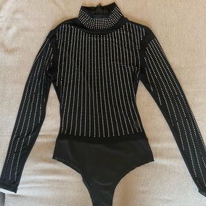 Studded black long sleeve bodysuit